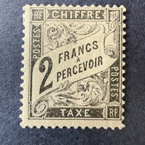 Taxe Y&T 23, "Duval 2fr noir" en neuf *. TB.