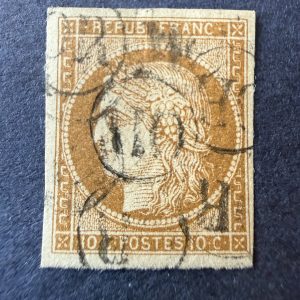 Yvert 1, "Cérès 10c bistre" en oblitéré "OR". Signé Scheller. TB.